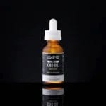 CBDMD CBD Tincture - Full Spectrum 3000mg bottle with white topper on a black background.