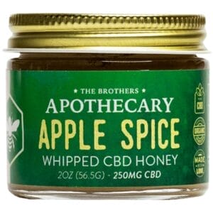 Apple Spice Whipped CBD Honey jar with warm apple and cinnamon spice flavor highlights