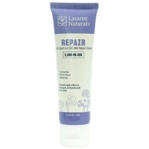 Front of CBD Skin Repair Cream tube with nourishing skin repair design